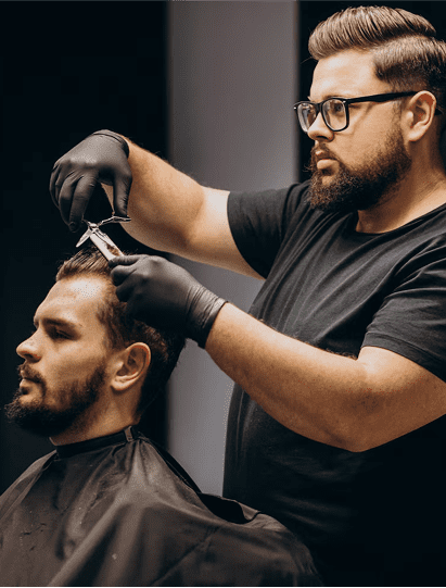 Barber cutting hair